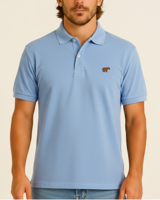 Polo azul bordada azul